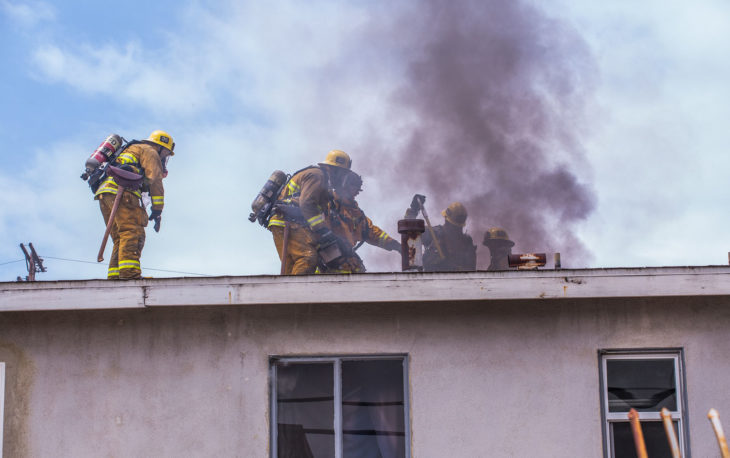 A fireman extinguishing fire