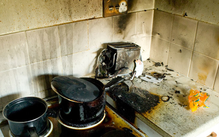 Remnants of pots and counter after a kitchen fire